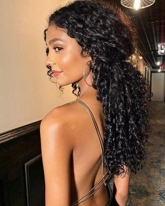 pulled back curly hairstyle 