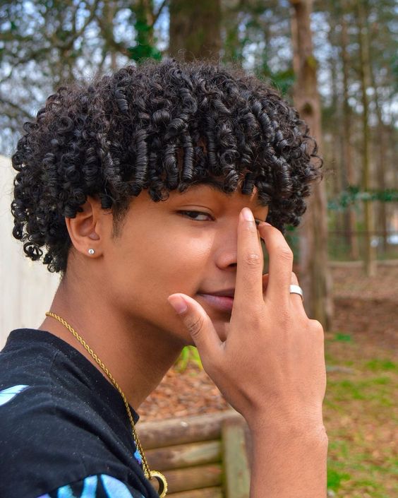 tight curly black teen guy hairstyle