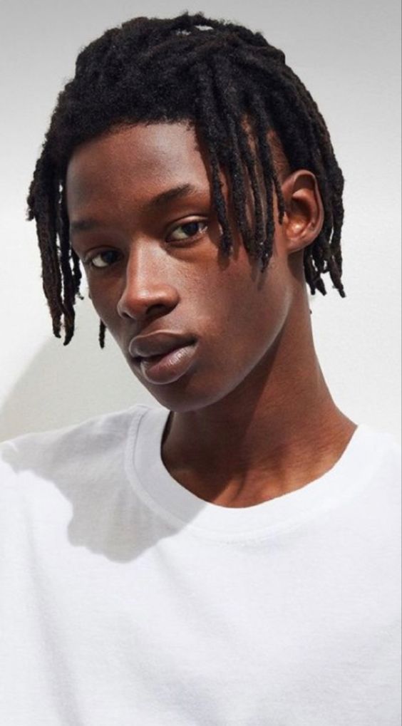 medium dreads black teenage boy