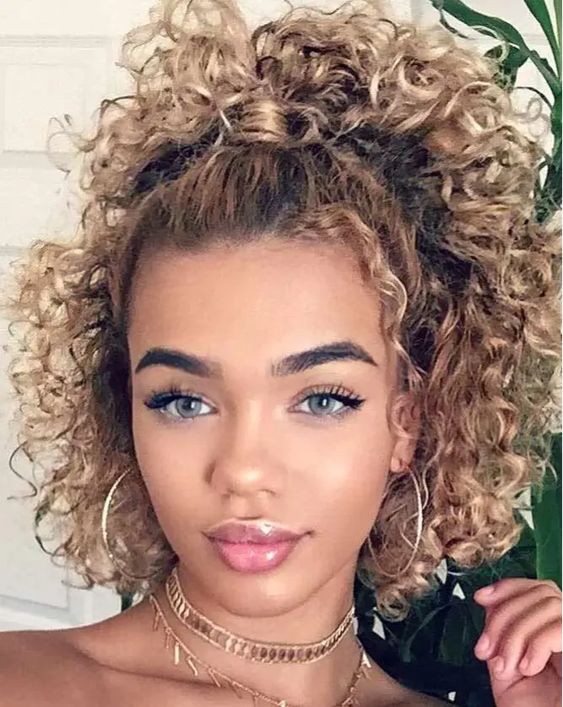 half up blonde curly hair