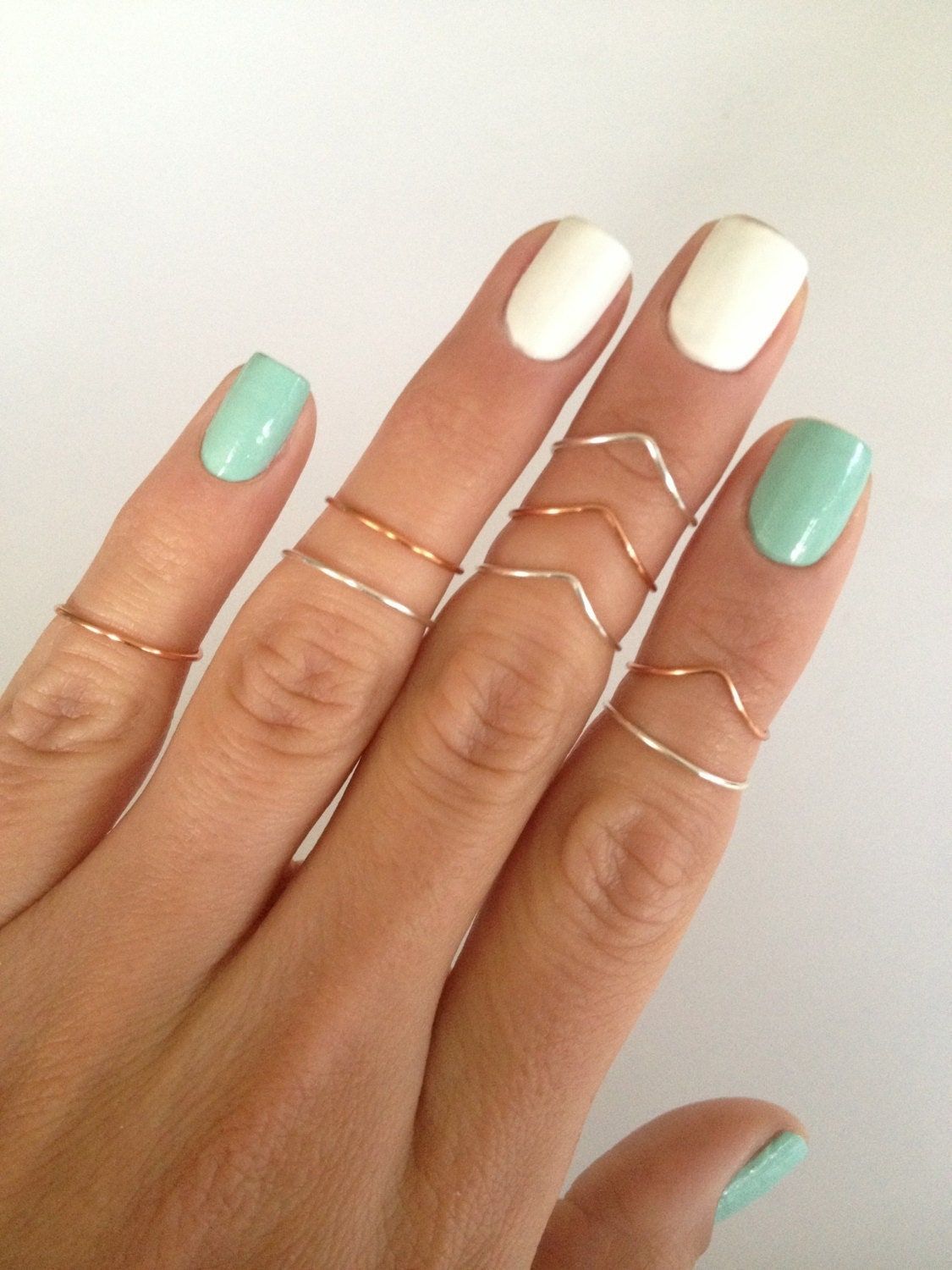 white and green nail design