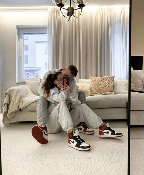cute red and black nikes for two people