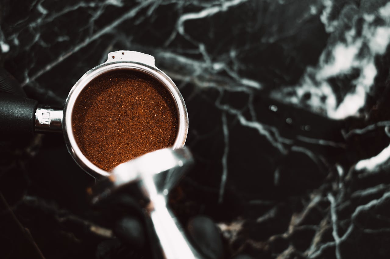 Used coffee grounds for odor control and compost