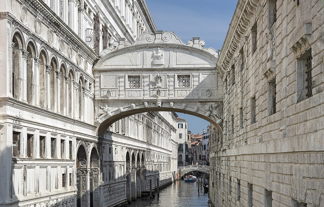 A Sunset Kiss Beneath Venice’s Bridge of Sighs