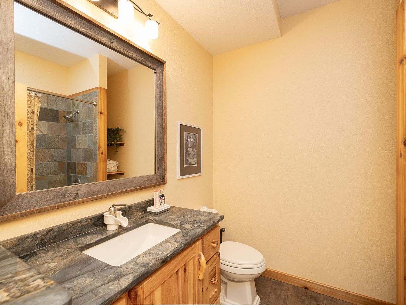 Cozy bathroom retreat with slate shower