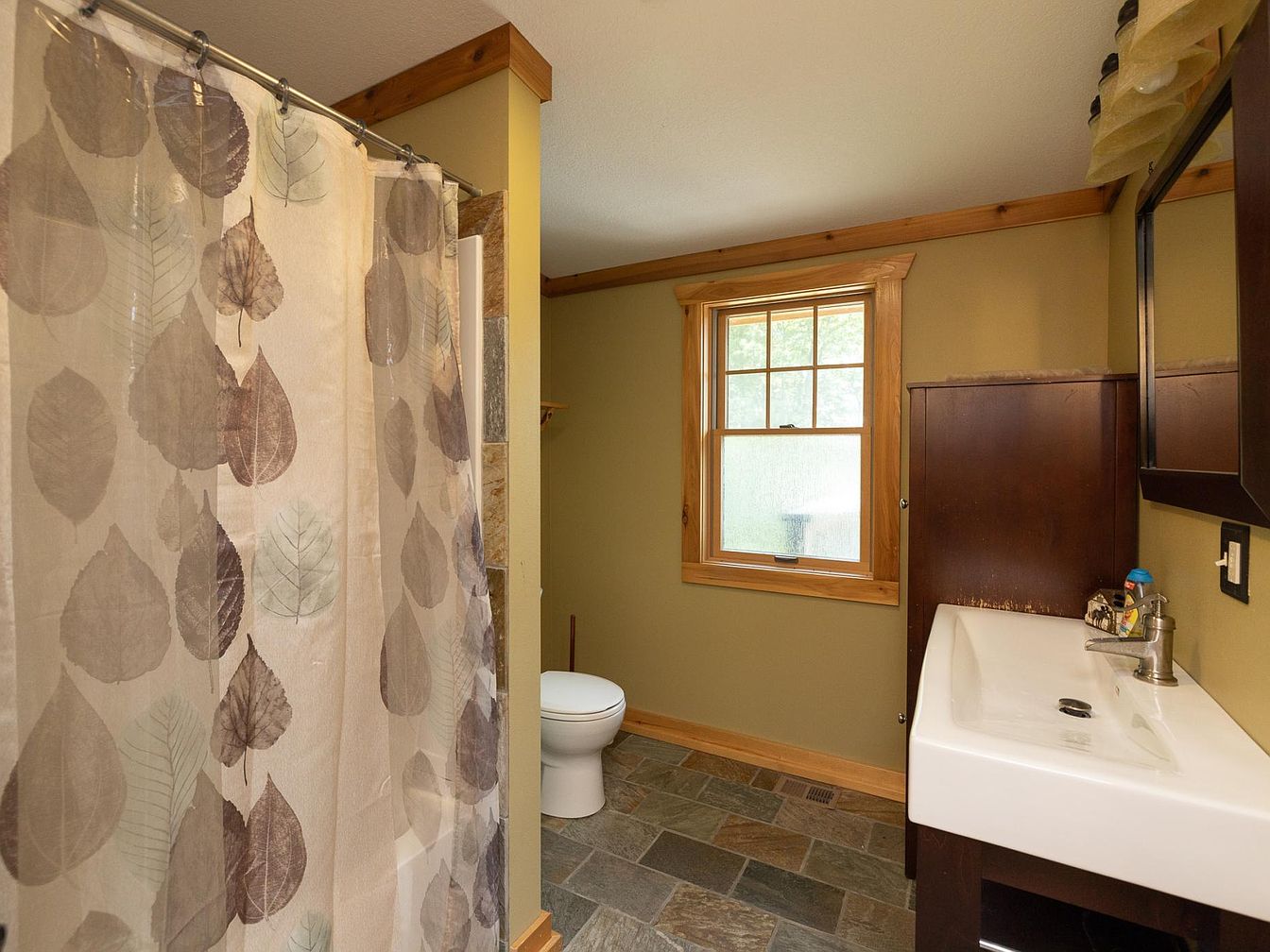 Bathroom design with green accents
