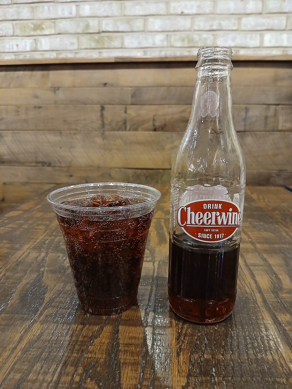 960px-Bottle_and_plastic_cup_of_Cheerwine_at_dinner