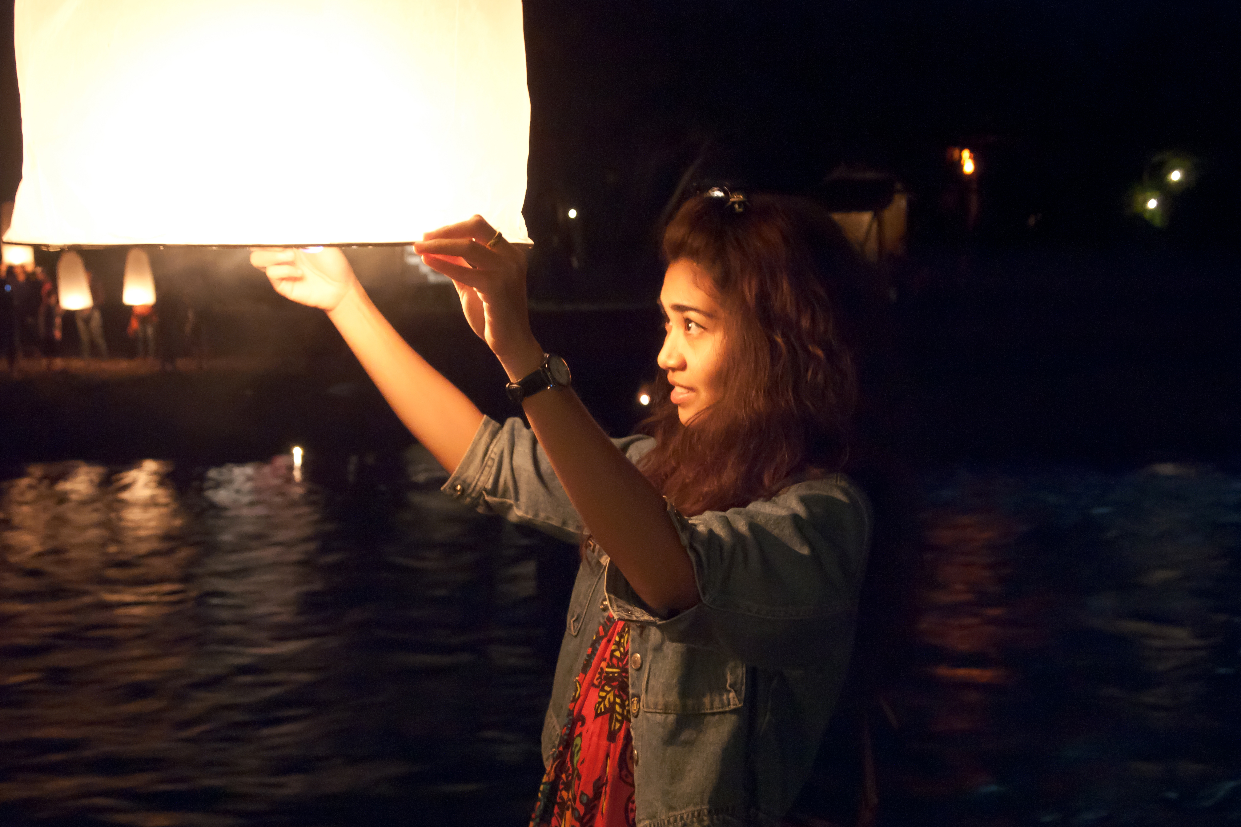 Loy Krathong: Floating Light Across Water