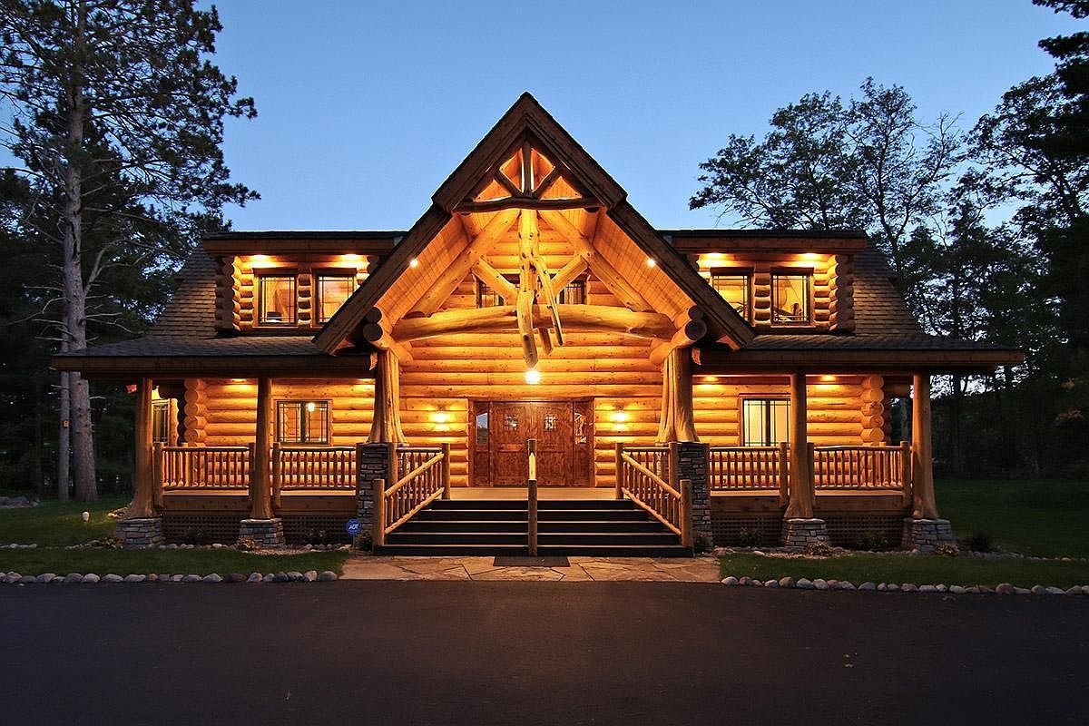 Rustic log home exterior with porch
