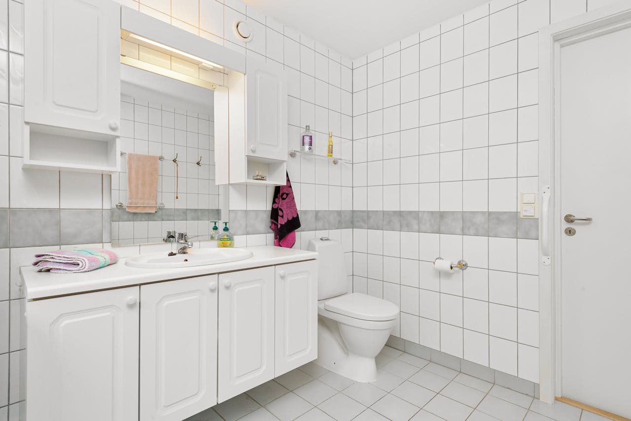 Swollen Vanity Bases And Delaminated Cabinets